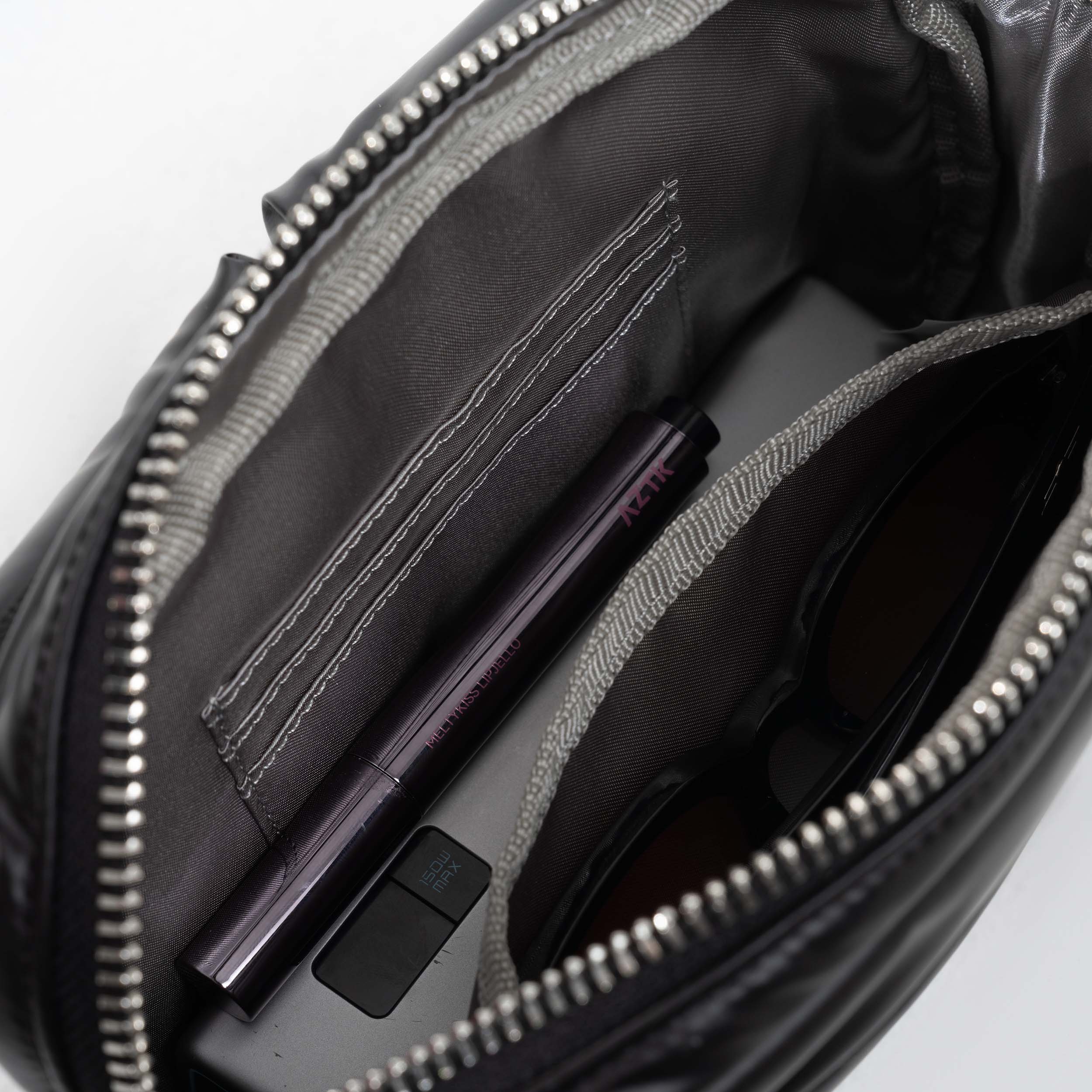 Tesport Cloud Crossbody Belt Bag in Black interior storage
