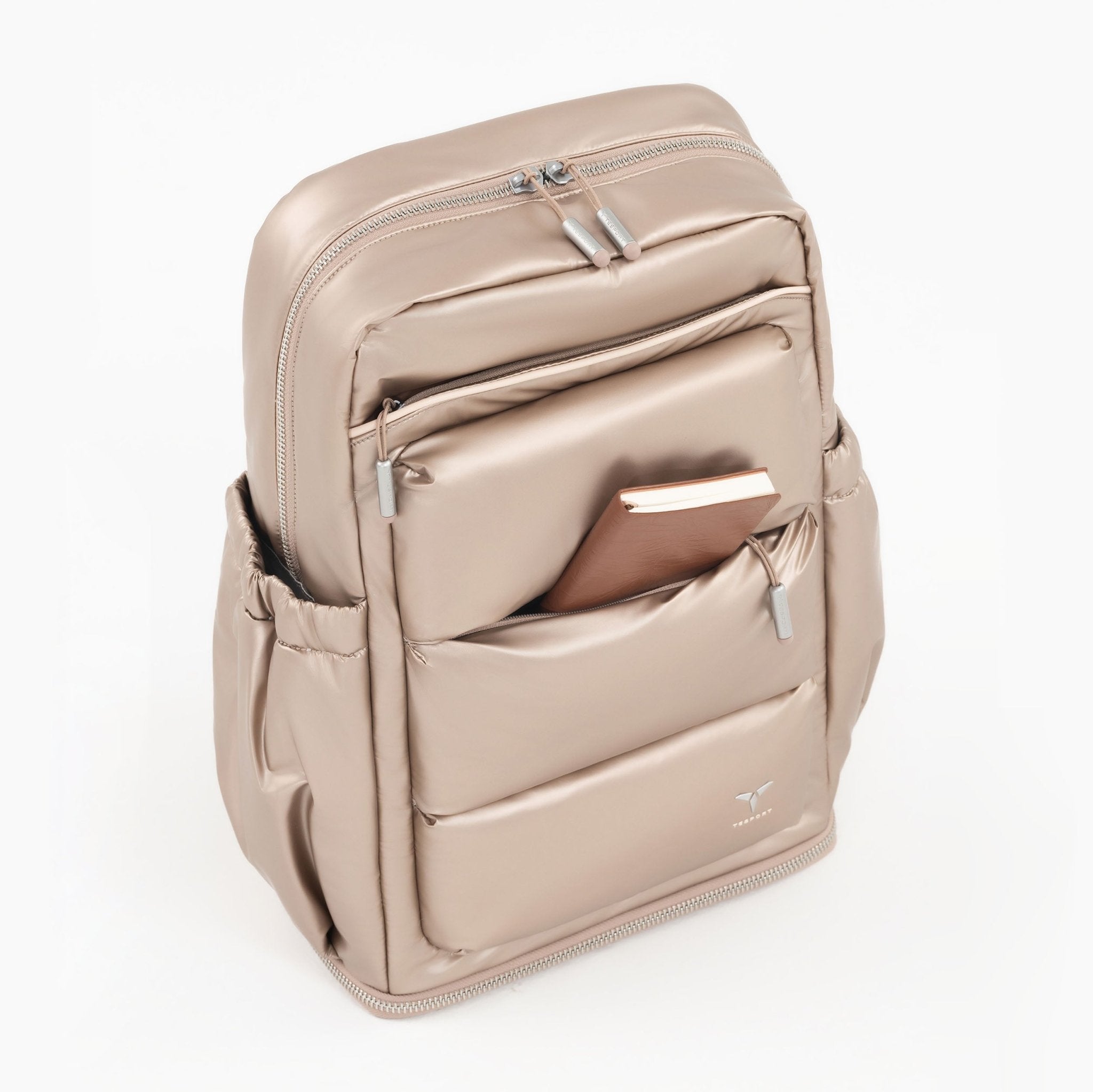 Tesport Cloud Large Backpack in Champagne holding book