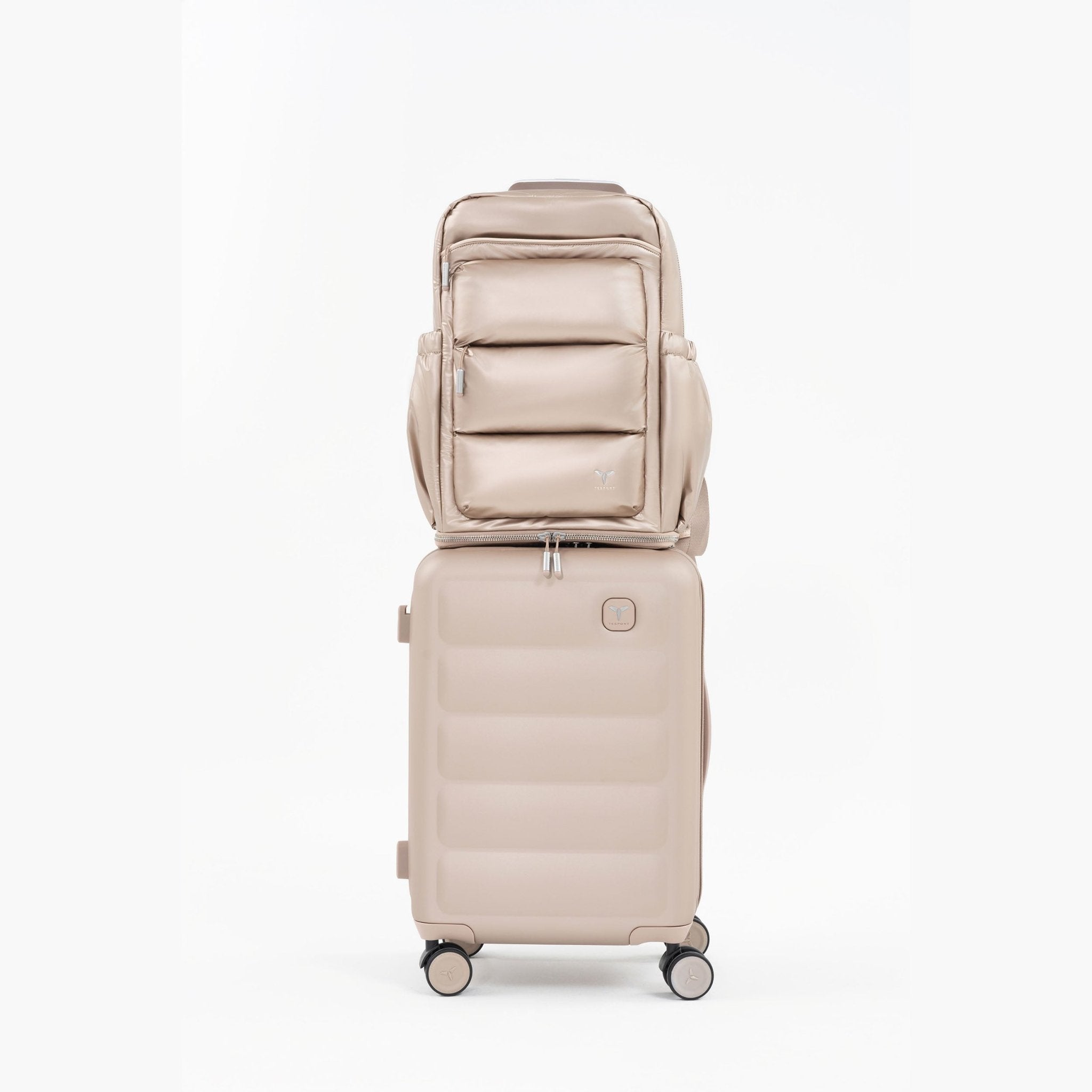 Tesport Cloud Large Backpack in Champagne on top of other luggage