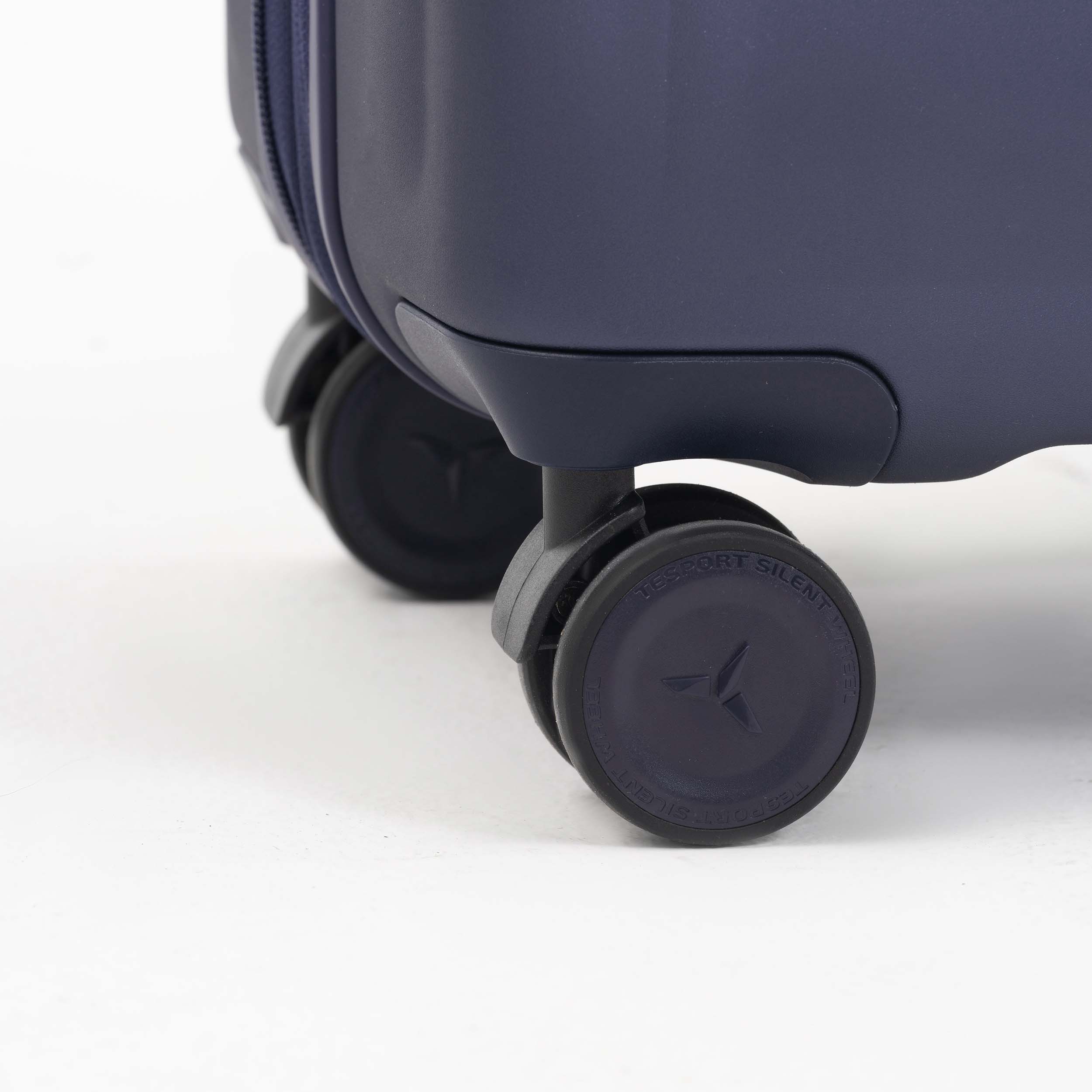 Tesport Cloud Flex Carry-On Luggage in Navy 360 wheel shot