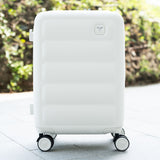 Tesport Cloud Flex Carry-On Luggage in White outdoor lifestyle shot