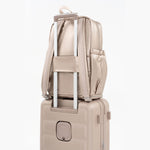Tesport Cloud Large Backpack in Champagne on top of other luggage