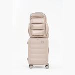 Tesport Cloud Large Backpack in Champagne on top of other luggage
