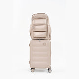 Tesport Cloud Large Backpack in Champagne on top of other luggage