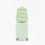 Tesport Cloud Large Backpack in Apple Green on top of other luggage