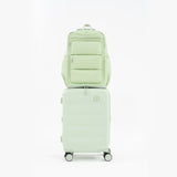 Tesport Cloud Large Backpack in Apple Green on top of other luggage