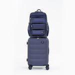 Tesport Cloud Large Backpack in Navy on top of other luggage
