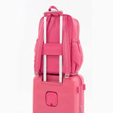 Tesport Cloud Large Backpack in Pink on top of other luggage