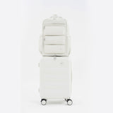 Tesport Cloud Large Backpack in White on top of other luggage